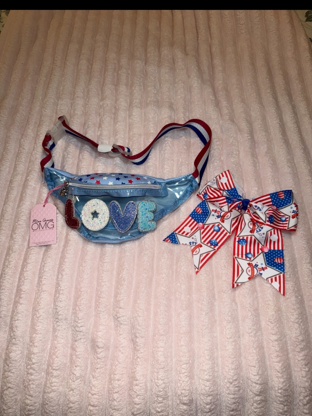 Miss Gwen's OMG fanny pack and a red, white, & blue hair bow NWT